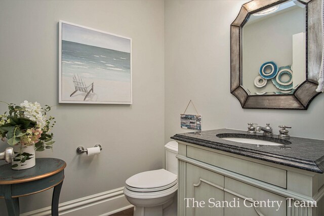 18635 N Fruitport Rd, Spring Lake, MI 49456 - half bath with vanity and toilet
