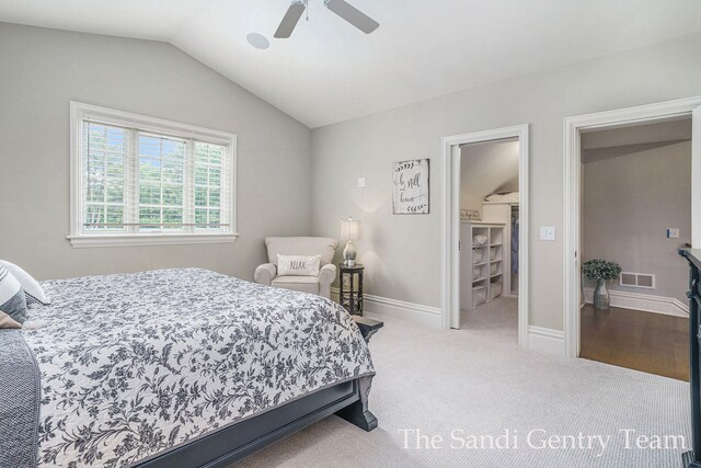 18635 N Fruitport Rd, Spring Lake, MI 49456 - carpeted bedroom with vaulted ceiling, a ceiling fan, and baseboards