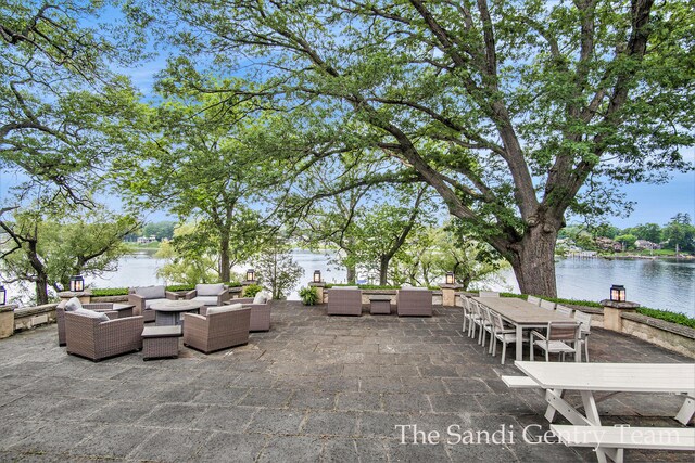 18635 N Fruitport Rd, Spring Lake, MI 49456 - view of patio / terrace featuring outdoor lounge area and a water view