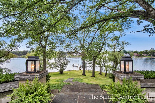 18635 N Fruitport Rd, Spring Lake, MI 49456 - view of grassy yard featuring a water view
