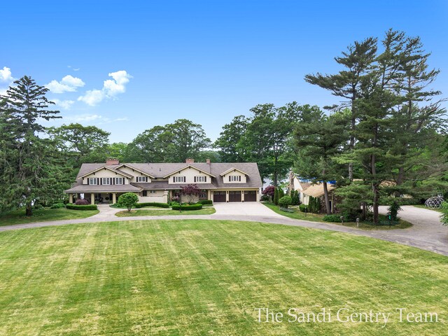 18635 N Fruitport Rd, Spring Lake, MI 49456 - view of front of property with driveway and a front lawn