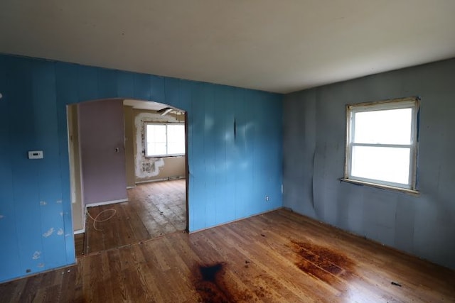 spare room with hardwood / wood-style flooring