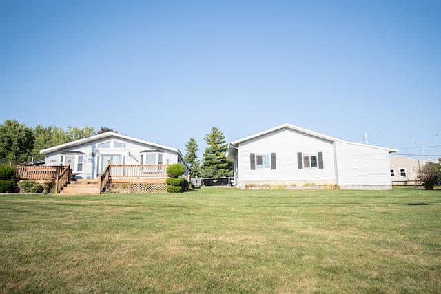 view of yard with a wooden deck