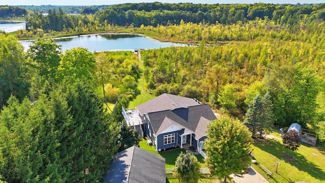 491 Bitter Creek Ln, Pierson, MI 49339 - view of subject property featuring a forest and a large body of water