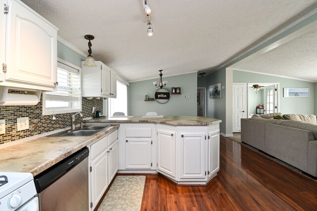 kitchen featuring white cabinetry, sink, dark wood-type flooring, stainless steel dishwasher, and pendant lighting