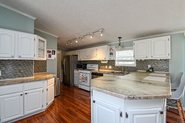 kitchen with white cabinetry and sink