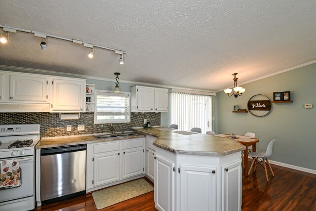 kitchen featuring dishwasher, white range, kitchen peninsula, white cabinets, and exhaust hood