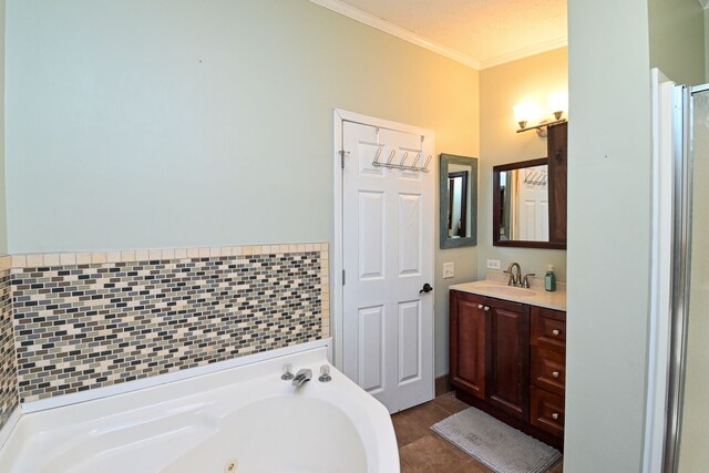 bathroom featuring a bathing tub, vanity, and ornamental molding