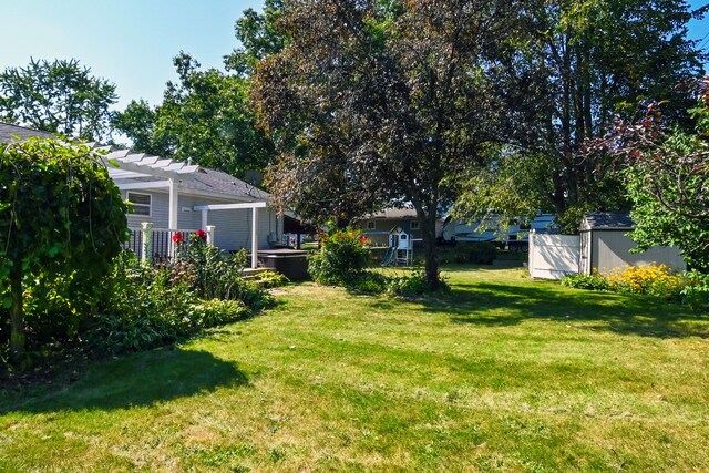 view of yard with a pergola