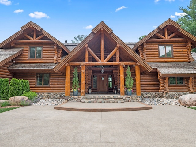 view of log-style house