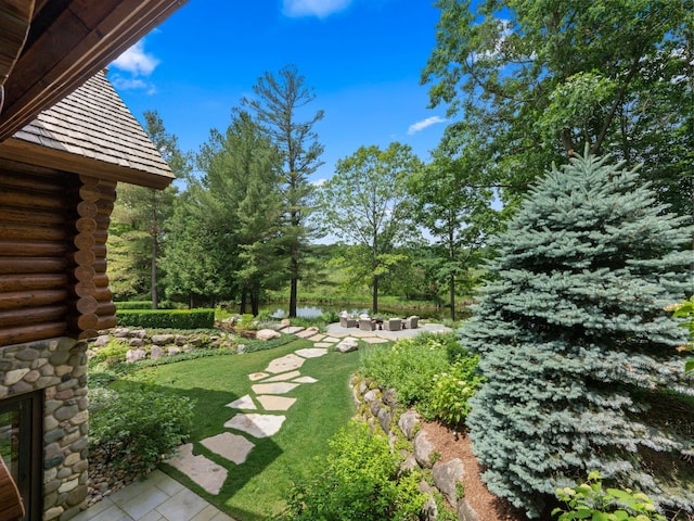 view of yard with a water view