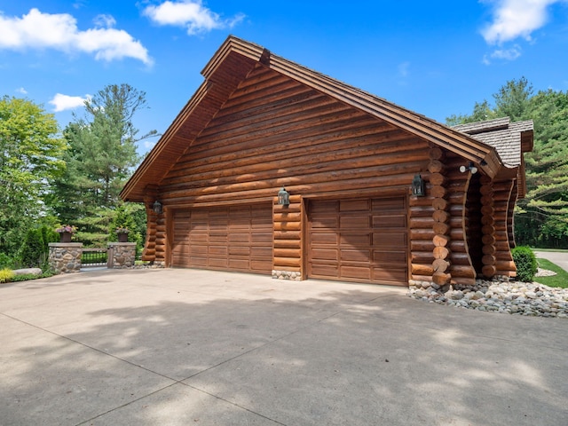 exterior space featuring a garage