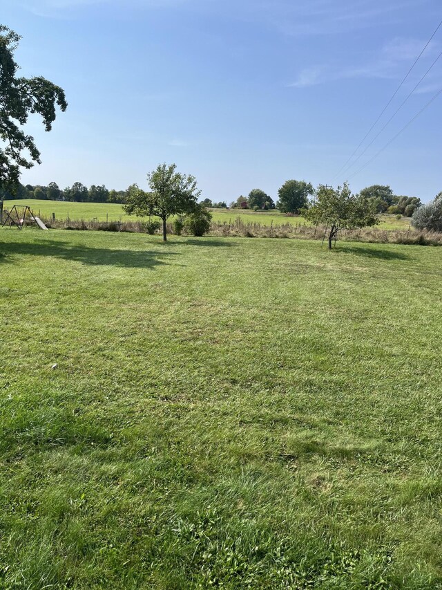 8181 15 Mile Rd, Evart, MI 49631 - view of grassy yard featuring a view of countryside