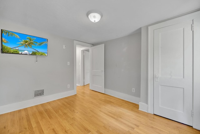 unfurnished bedroom featuring light hardwood / wood-style flooring