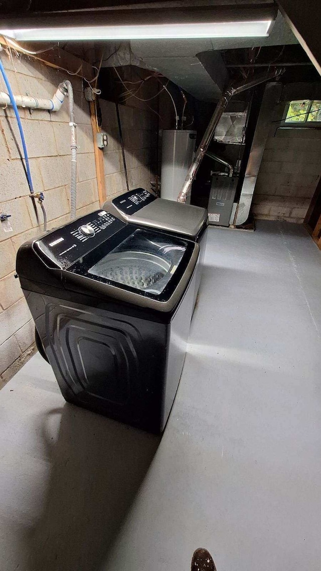 laundry room with water heater