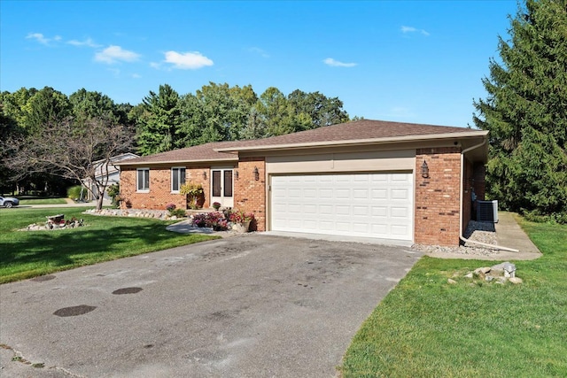 ranch-style home featuring central AC, a front yard, and a garage