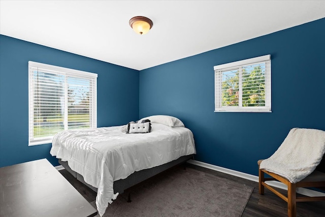 bedroom featuring dark hardwood / wood-style floors