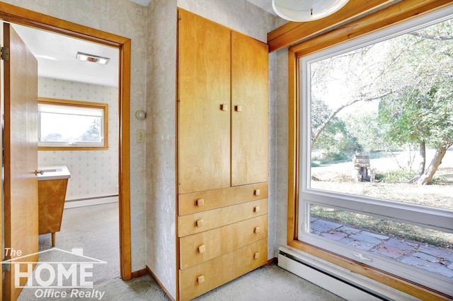 interior space featuring baseboard heating