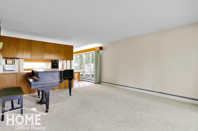 interior space with a baseboard radiator, light carpet, and a textured ceiling