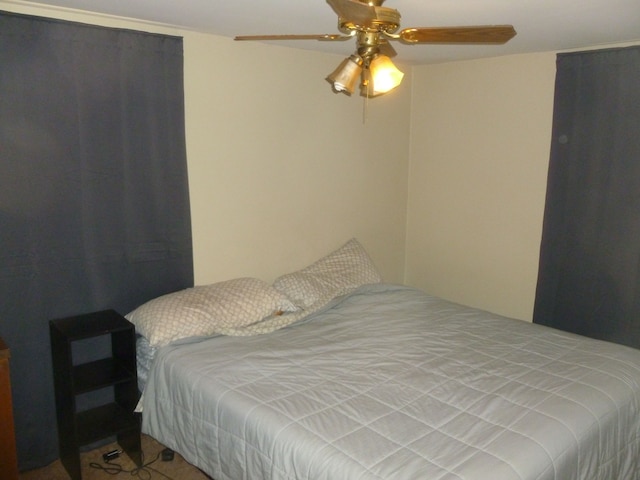 bedroom featuring ceiling fan