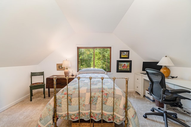 bedroom with light carpet and vaulted ceiling