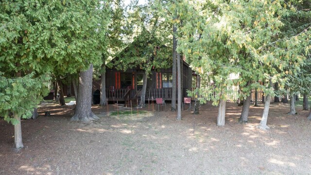 4281 Franklin Trl, Sterling, MI 48659 - view of property hidden behind natural elements with covered porch