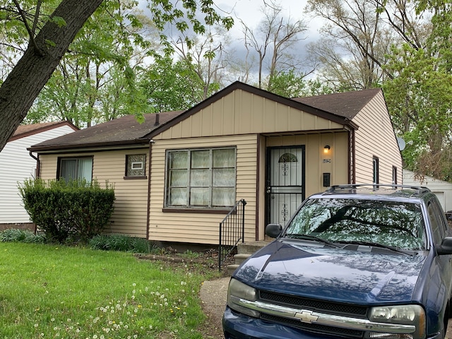 view of front of home with a front yard