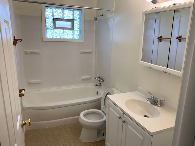 full bathroom featuring washtub / shower combination, tile patterned floors, vanity, and toilet