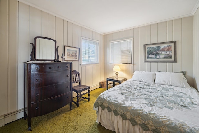 carpeted bedroom featuring crown molding