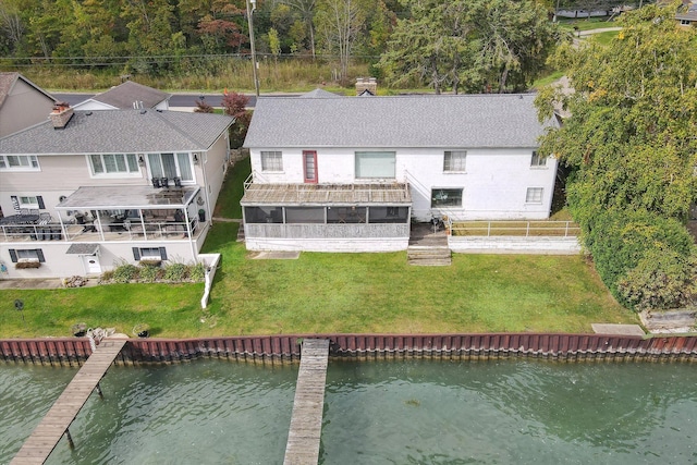 bird's eye view with a water view