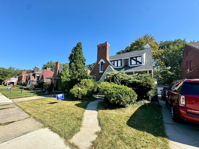 view of front of home with a front yard