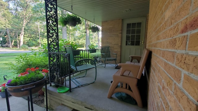 view of patio featuring a porch