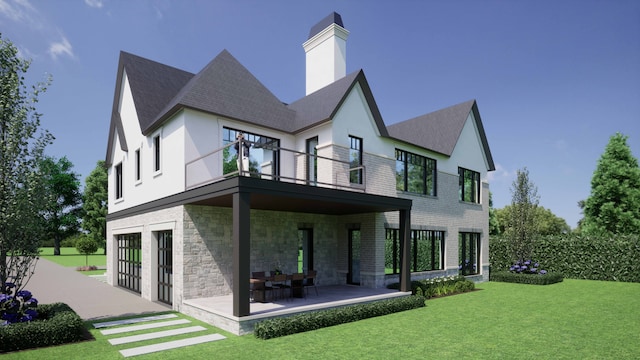 rear view of house featuring a patio, a balcony, and a lawn