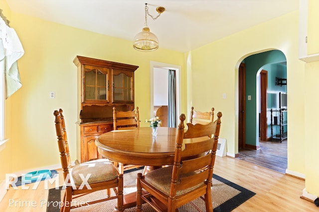 dining room with light hardwood / wood-style flooring