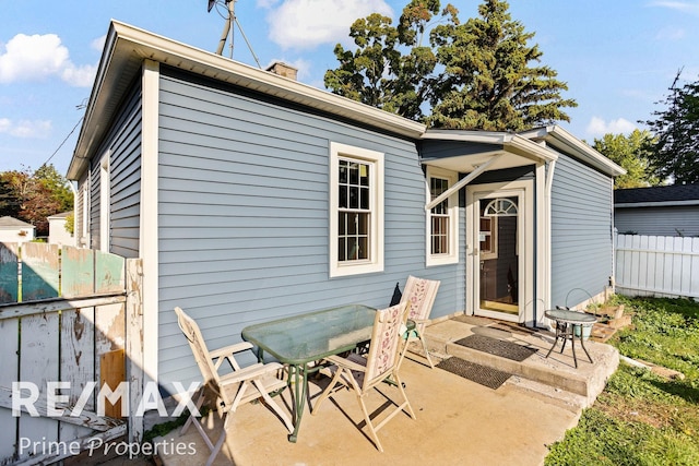 back of house with a patio