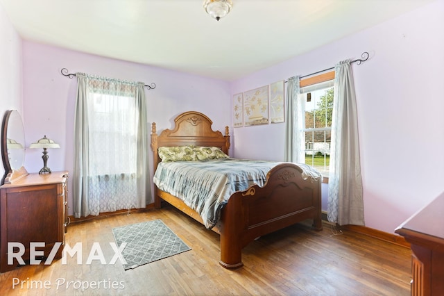 bedroom featuring light wood-type flooring