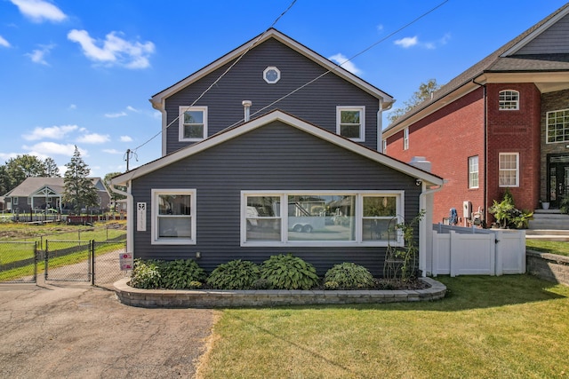 view of home's exterior with a lawn