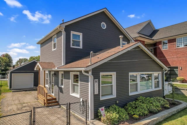 exterior space with an outdoor structure and a garage