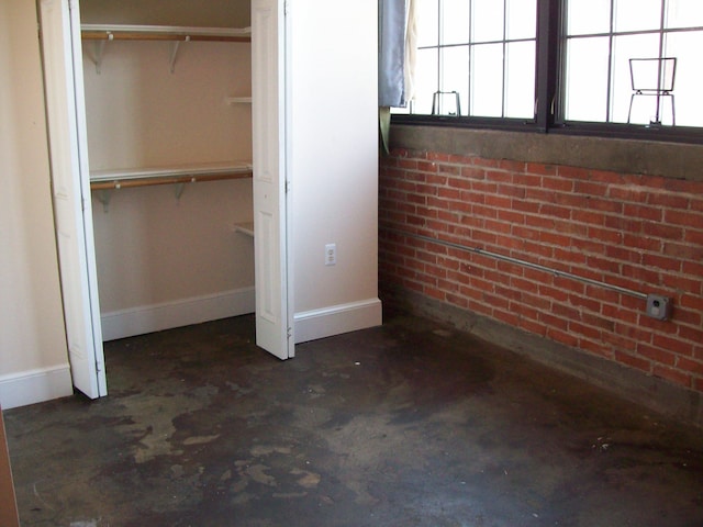 unfurnished bedroom with a closet