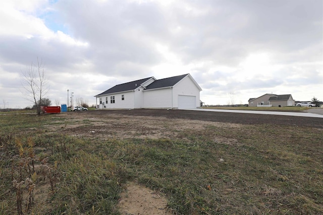 view of home's exterior featuring a garage