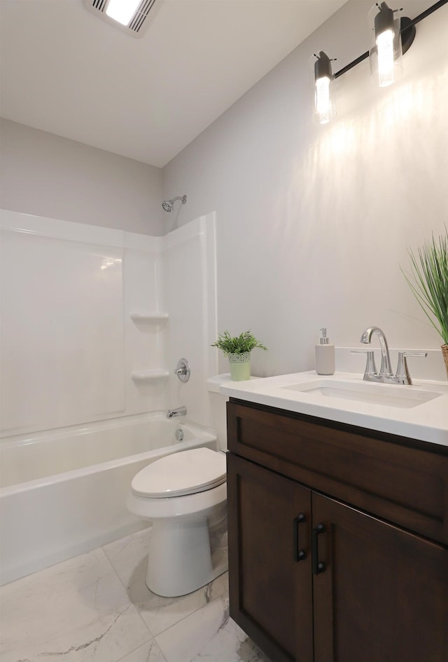 full bathroom with vanity, shower / washtub combination, and toilet