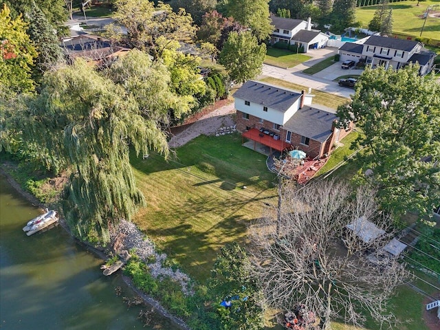 drone / aerial view with a water view