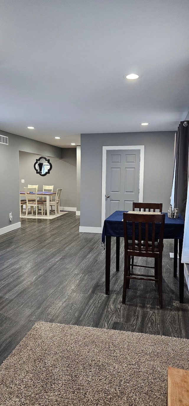 dining room featuring dark wood-type flooring