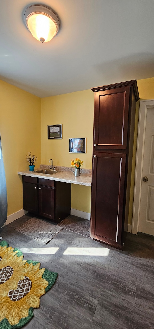 bathroom featuring hardwood / wood-style flooring and vanity