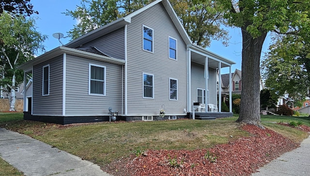 view of home's exterior featuring a lawn