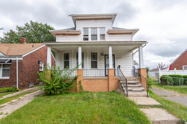 bungalow with a front lawn