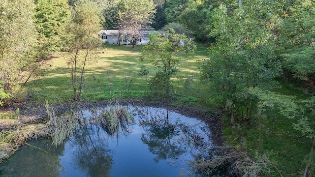 drone / aerial view with a water view