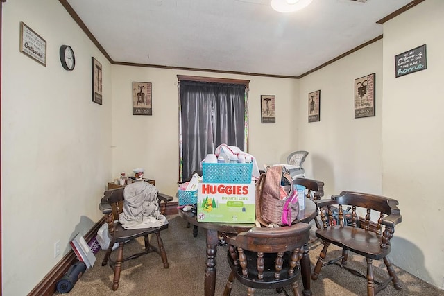 dining area featuring carpet and ornamental molding