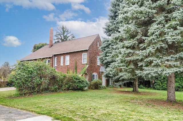 view of home's exterior featuring a lawn