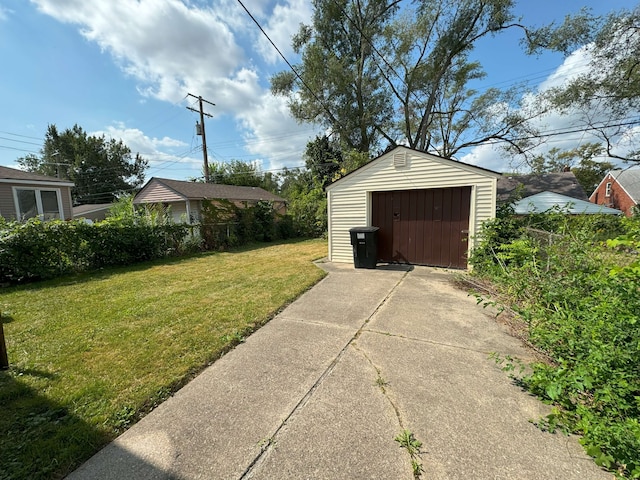 garage with a yard